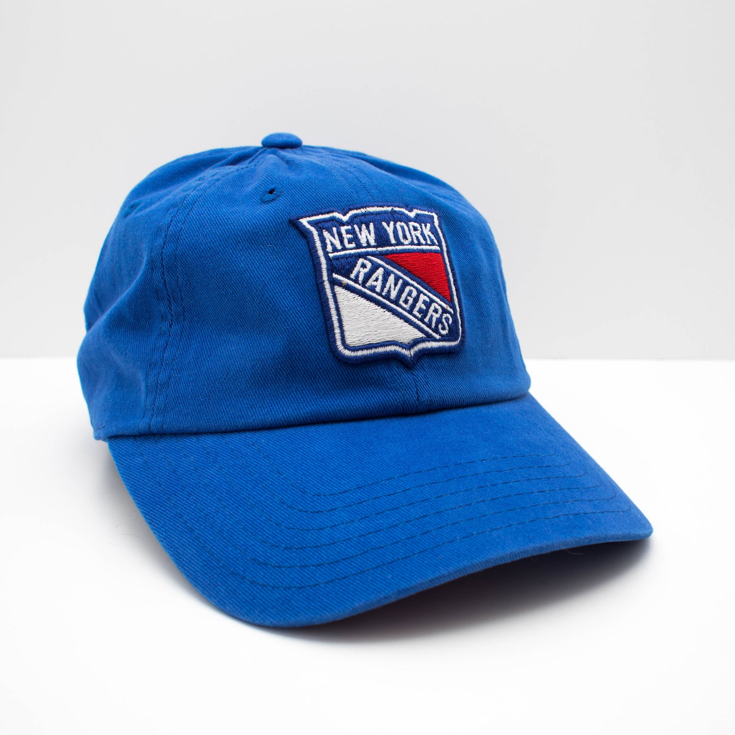 New York Rangers Hats: Faded Blue Snapback Dad Hat | NHL