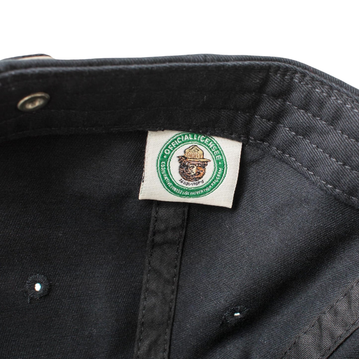 AMERICAN NEEDLE Smokey Bear Adjustable Buckle Strap Baseball Hat, Washed Micro Slouch Collection, Black (PI023A-SMOKEY-BLK)