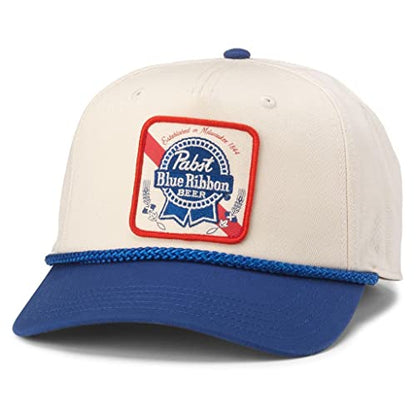AMERICAN NEEDLE Pabst Blue Ribbon Beer Roscoe Adjustable Snapback Trucker Baseball Hat (23008A-PBC-IROY) Ivory/Royal