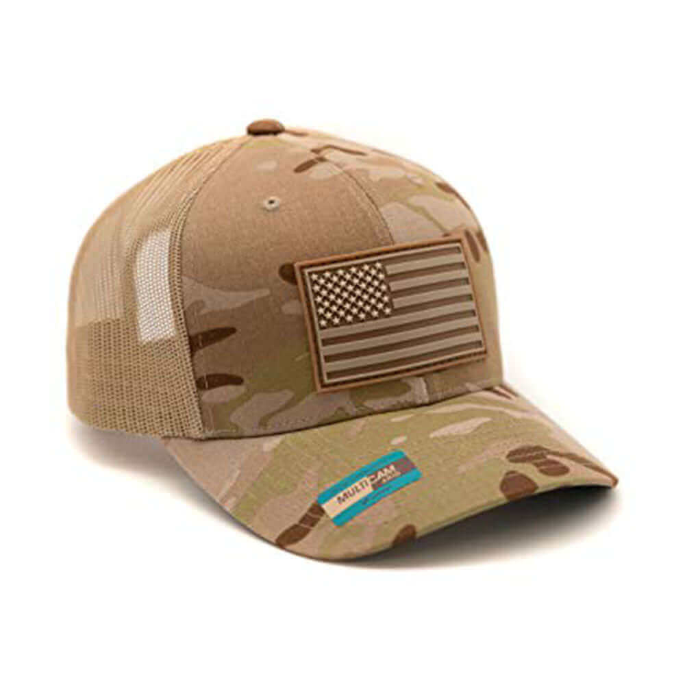 Right angle photo of American flag trucker hat with Multicam Arid camouflage pattern, tan mesh backing, and a premium quality PVC patch.