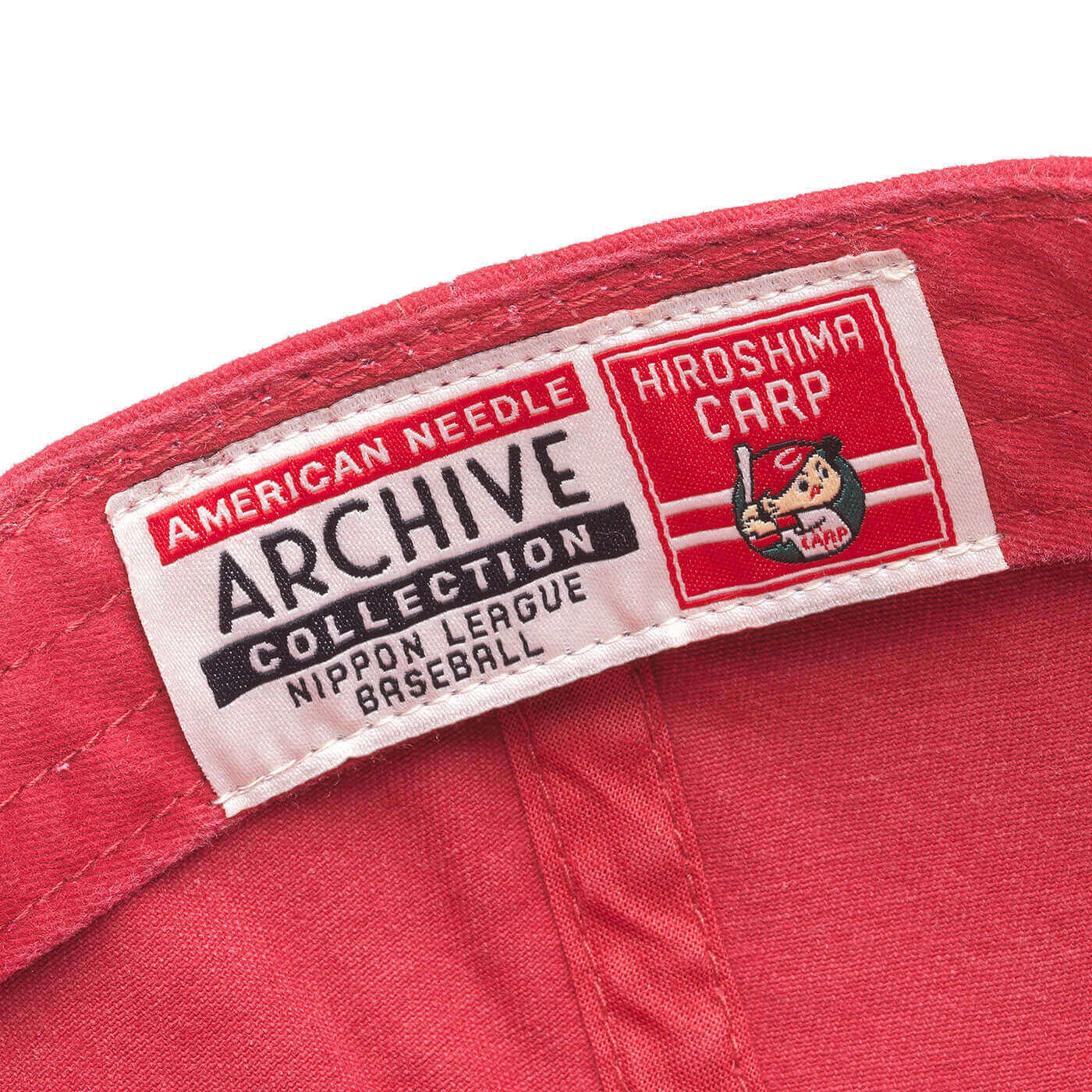 Hiroshima Toyo Carp Hat: Red Strapback Dad Hat | Nippon League tag